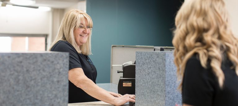Female teller helping a customer